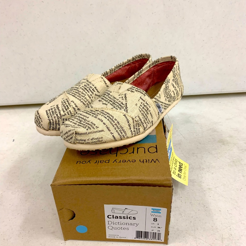Toms Classics Slip-On Flats in Cream with Black Print and Red Lining